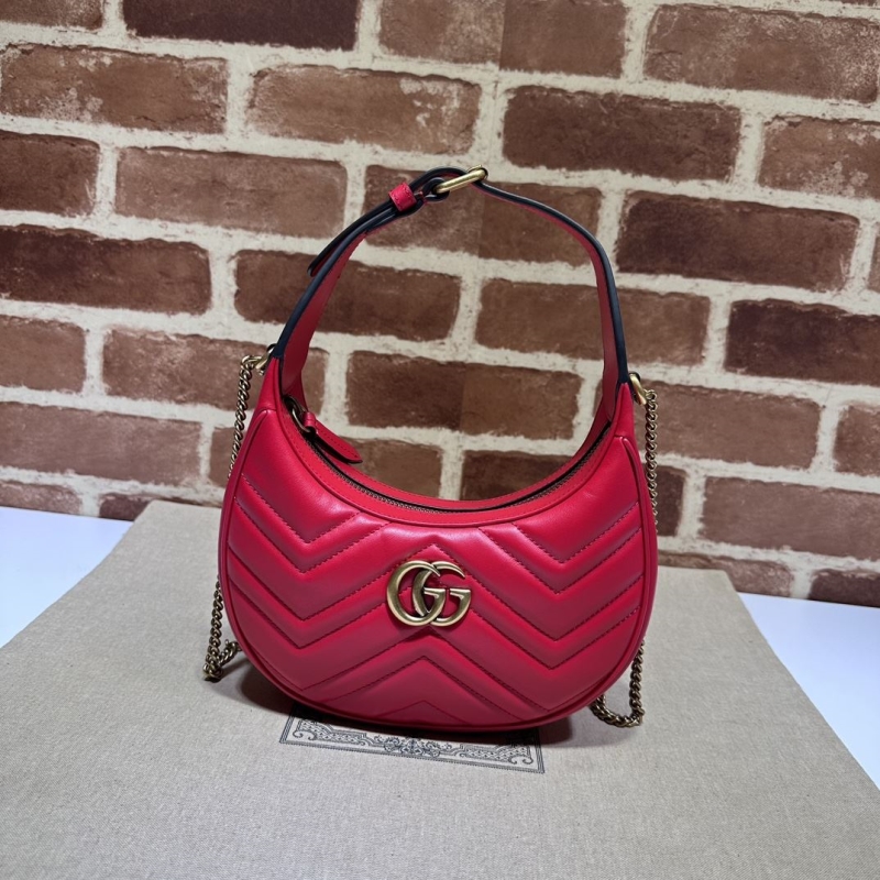 G*u*i top handle bags